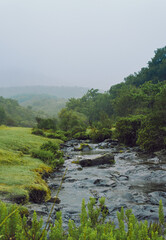 Naklejka na ściany i meble Idyllic landscape in the mountains with river