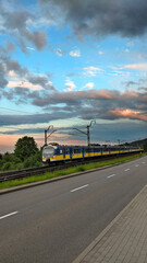 Train on railway cross the mountain for local transportation.