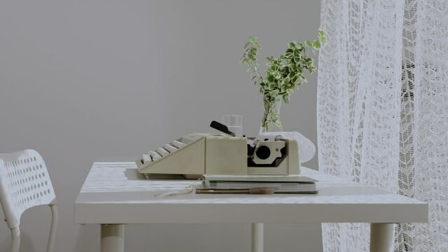 Table of a playwright during summer morning. Closeup