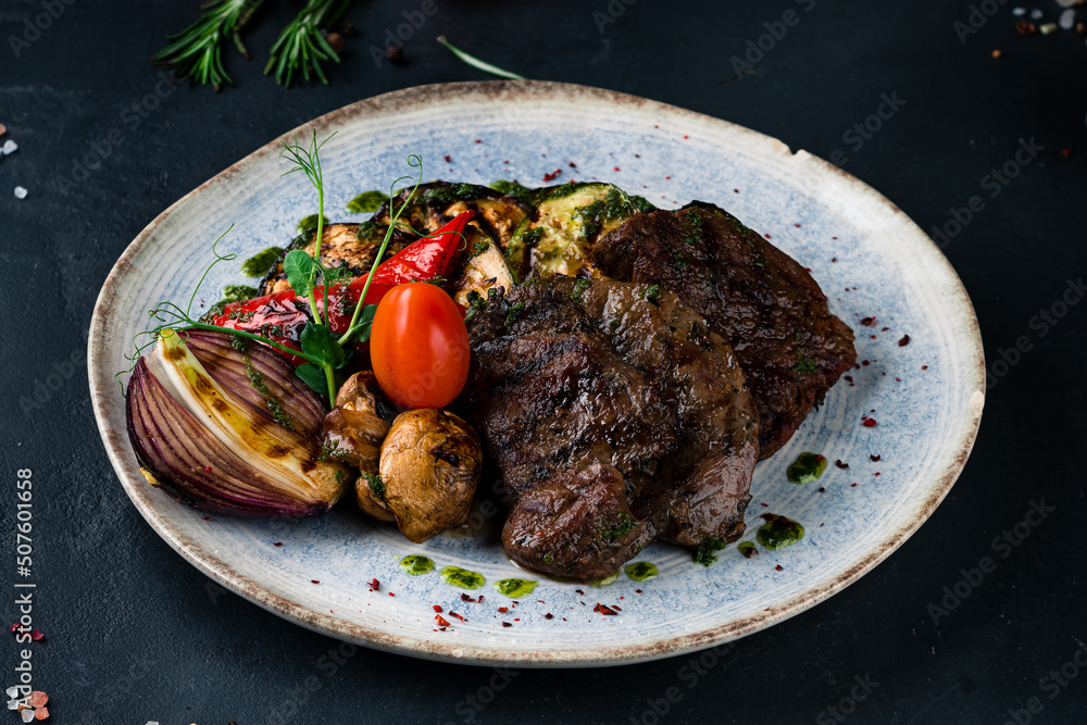 Sticker beef medallions with grilled vegetables