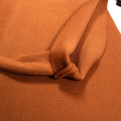 Close-up. Stylish female image. Woolen pants on a white background.