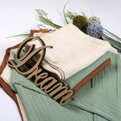 Stylish women's woolen suits on a white background.