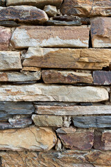 Rectangular stone wall in ocher tones