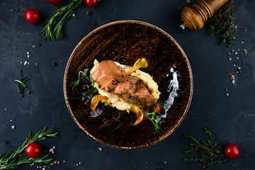 Traditional German braised beef cheeks in brown red wine sauce with spaetzle herbs - obrazy, fototapety, plakaty