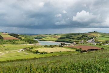View from the South West Coastal Path near Thurlestone towards Buckland village in Devon