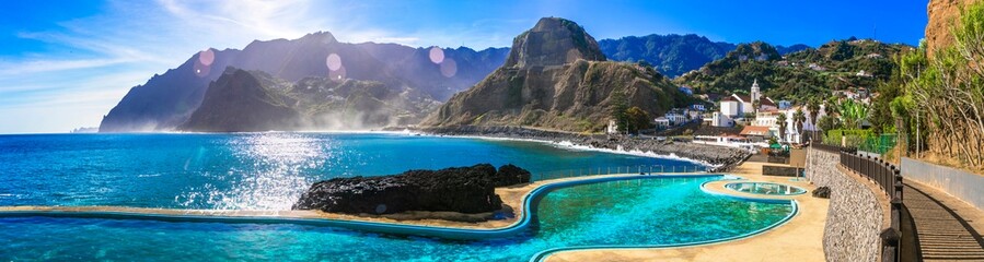 Scenic Madeira island, natural swimming pools of charming Porto da Cruz village. Popular tourist resort in Portugal - obrazy, fototapety, plakaty