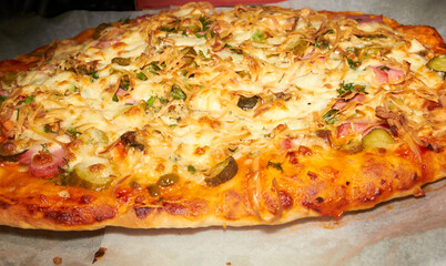 homemade pizza just taken out of the oven