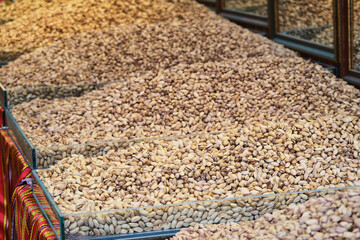 Selective Focus Roasted Salty or Salted Pistachio in Shop Design. 