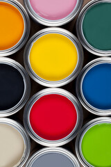 Painting and Decorating - Tins of color emulsion paint.