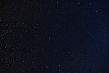 Fototapeta na wymiar Night sky. Stars and galaxies in the sky at dusk.