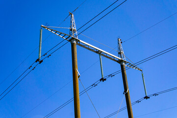 Power lines with cables and metal towers