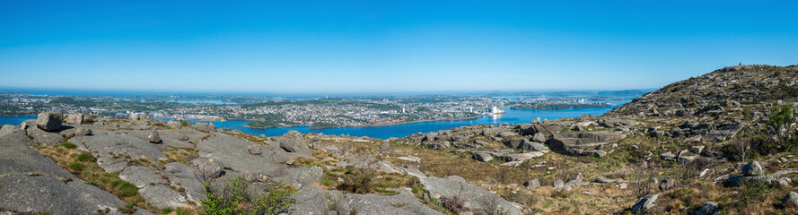 Fototapeta na wymiar Panorama of rocky landscape of Lifjel mountain and a view to Gandsfjord and Stavanger city, Norway, May 2018