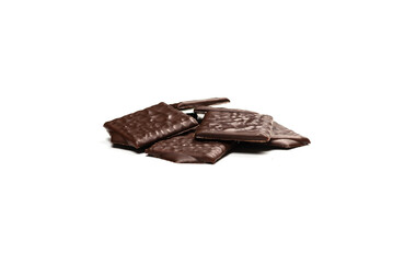 Dark chocolate candies isolated on white background.