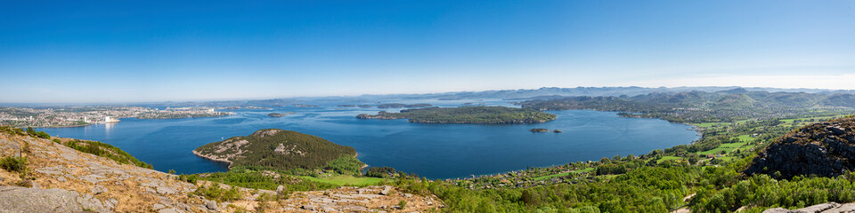 Fototapeta na wymiar Panorama of islands and fjord from Lifjel mountain, Sandnes, Norway, May 2018