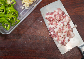 top view chopped pork with pepper and garlic