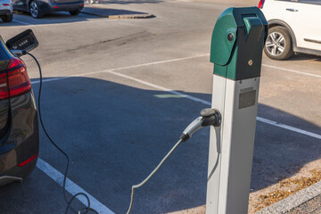Fototapeta premium Beautiful view of charging station for electric car. Sweden.