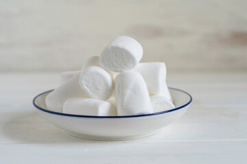Marshmallow on white background. Holiday food.