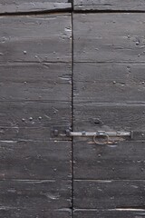 wooden brown door with an old lock