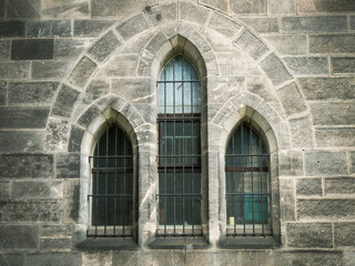 Fototapeta na wymiar Ancient windows in the church in the South Star.