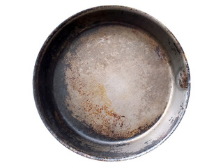 Old metal frying pan for cooking. Dirty dishes empty, food template.