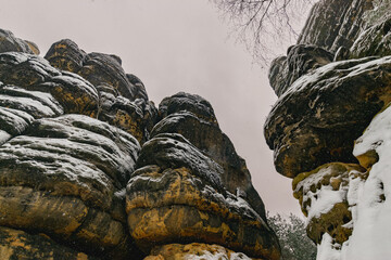 snowy hiking path at the Elbsandsteingebirge (Saxon Switzerland, Germany)