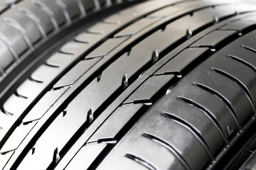 Automobile tire tread with a depth of the car