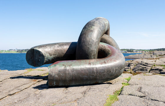 A broken chain link in Brutt Lenke monument in memory of offshore oil rig Alexander Kjelland disaster accident, Stavanger, Norway, May 2018