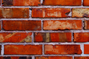 Red brick wall close up