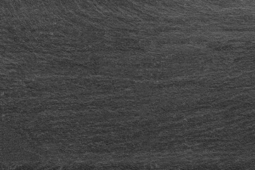 Dark grey black slate background or texture.