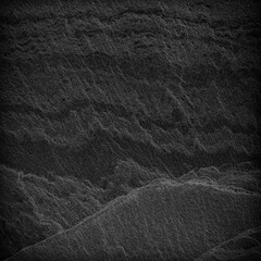 Dark grey black slate background or texture.