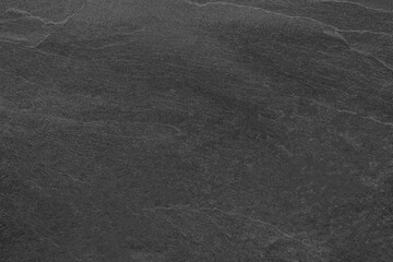 Dark grey black slate background or texture.