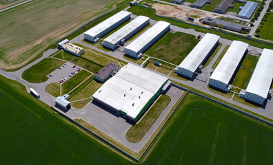 Aerial view of the rural landscape with agro farms barns and stables. Chicken coops © Payllik