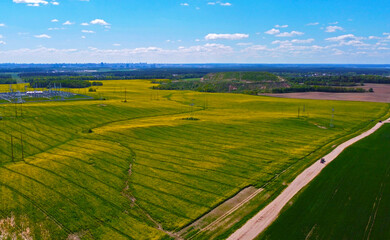 Aerial view of agro rural green fields and rustic landscape