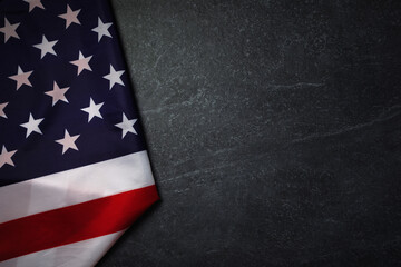 Fototapeta premium Flag of United States of America on marble background, layout image
