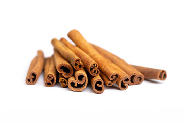 Cinnamon sticks on white background isolated. Indian spices close up. Medicinal herbs and spices.
