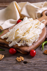 String cheese. Delicious cheese made from fresh cow's milk. Local name tel peyniri. Close-up