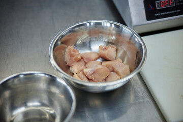 Fototapeta na wymiar Raw chicken fillet cut into pieces 