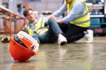 Selective focus at hat, Men worker feel painful and hurt from the accident that happen inside of...