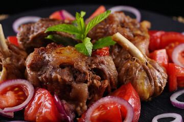 Spanish cuisine, stewed beef tail with spices. Homemade food.