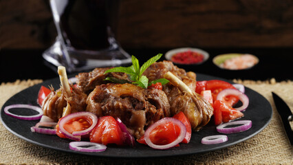 Spanish cuisine, stewed beef tail with spices. Homemade food.