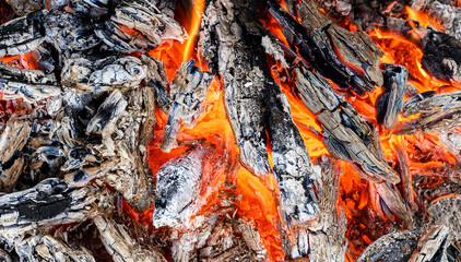 Burning charcoal grill. Smoldering coals in bonfire.