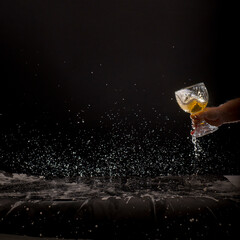 Beer splashing on table