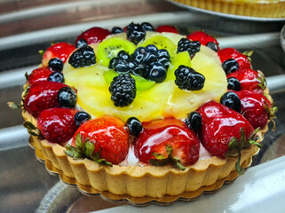 Assorted fruit pie, strawberry, pineapple, kiwi, mango, cherry