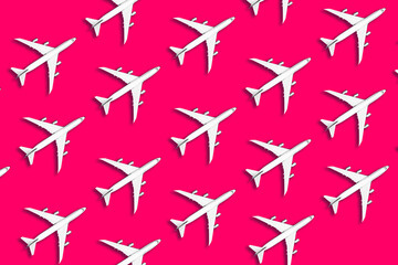 Creative banner of white planes on yellow background. Travel, vacation concept. Travel, vacation ban. Flights cancelled and resumed again. Top view. Flat lay. Minimal style design. Summer pattern.