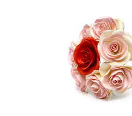 A bunch of bunches of roses laid out on a white background.