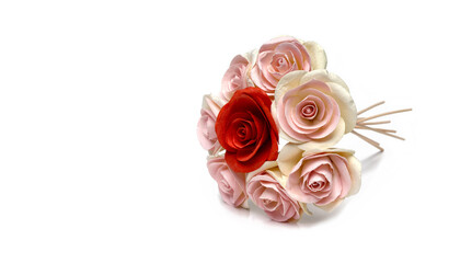 A bunch of bunches of roses laid out on a white background.