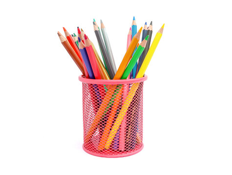 Colored pencils in red pencil box isolated on white background.