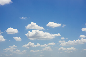 beautiful blue sky and white fluffy cloud horizon outdoor for background.