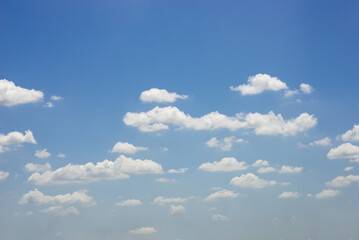 beautiful blue sky and white fluffy cloud horizon outdoor for background.