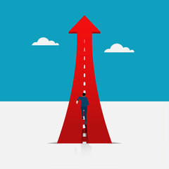 ambitious businessman running on a growth arrow path to the target.